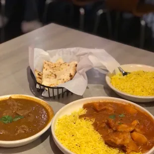 Lamb Curry and Chicken Vindaloo. Turmeric rice and garlic naan.