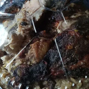 Jerk chicken leg with cook up $10 special
