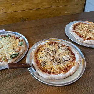 Trio of pizzas