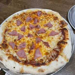 Craft your own pizza with Canadian Bacon &amp; cheese