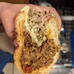 Slow-roasted pork shoulder sandwich