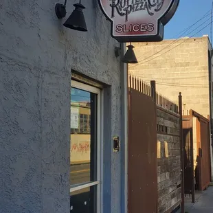 a sign on the side of a building