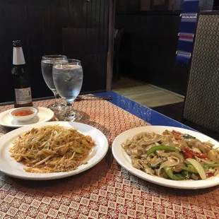 Pad Thai and Drunken Noodles. Standard Thai fare, but well made and tasty. :)