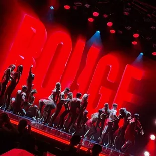 a group of dancers on a stage