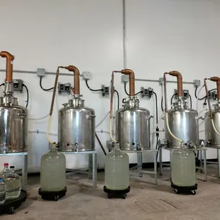 a row of distilling tanks