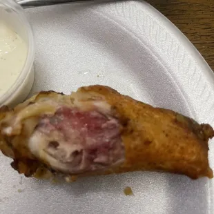 The wings were raw inside!