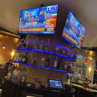 two televisions on the wall