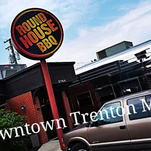 a truck parked in front of a building