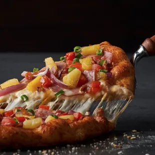 a slice of pizza on a spatula