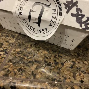 Second box of wings, looks like label was peeled off and placed back on...poorly