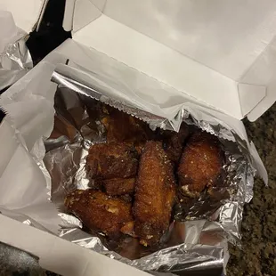 Wings look overdone and there is one missing.