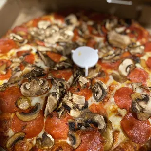 Medium pepperoni and mushroom