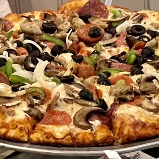 pepperoni, olives, and cheese