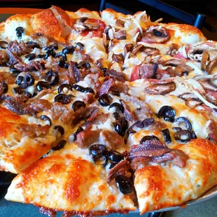 1/2 - Salami Mushroom Onion 1/2 - Sausage Black Olive Anchovy  Creamy Garlic sauce under all!    Mmmmmmm