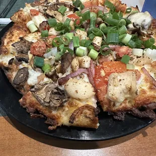 Chicken and Garlic Gourmet Pizza Personal Size. You better like green onions.