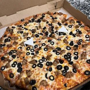 Sausage and olive pizza