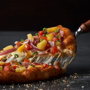 a slice of pizza on a spatula