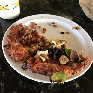 I ate half of it already lol. Personal pizza. King Arthur Supreme on right and Ulti-meat on left. It's got bacon.  Can't beat bacon.