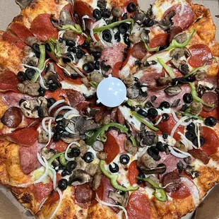 pepperoni, olives, and mushrooms