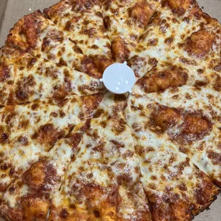 a pizza in a cardboard box