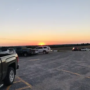 a parking lot at sunset