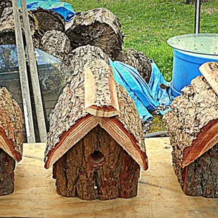three birdhouses made of wood