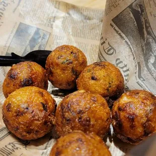 Takoyaki... bummed they didn't have toppings. Usually topped with its special sauce, mayo &amp; the "brown" flakes.