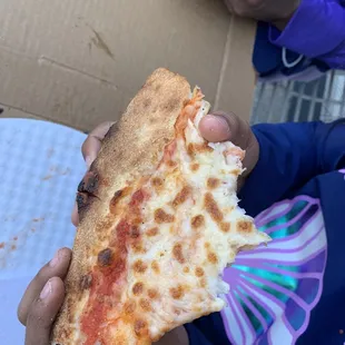 Yummy slice of cheese pizza.  Thanks guys! Little one loved it.