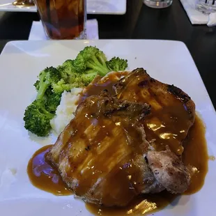 Pork Chops mashed potatoes and broccoli