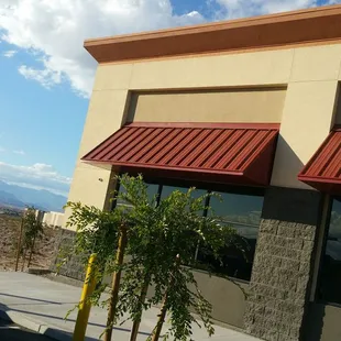 a car parked in front of a restaurant