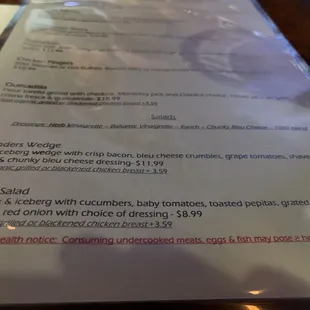 a menu on a table at a restaurant