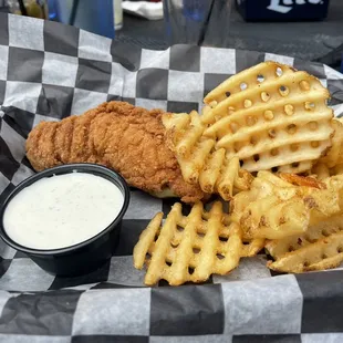 Small bites chicken tenders with waffle fries and one dipping sauce of choice