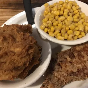 Pork chops, fried green tomatoes and corn