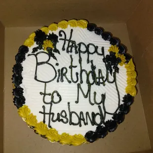 Supposed to be a Saints Logo cake. Looks like a cooking school project, horrible writing and fleur-de-lis.