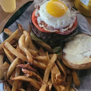Build your own burger with fried egg and fresh cut fries