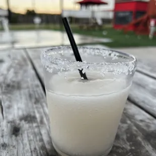 a drink in a glass with a straw