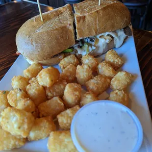 Philly Cheesesteak for $16.99 + $0.99 up-charge for Tots.