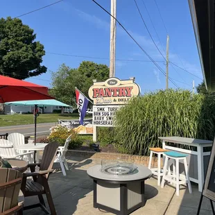 seating area with tables and umbrellas