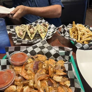 Steamed shrimp, tuna tacos and truffle fries.