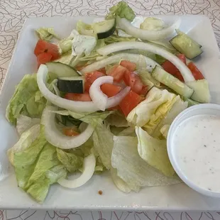 Side salad of wilted lettuce