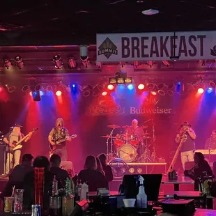 a band performing on stage