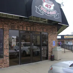 Front doors on the corner of the building.