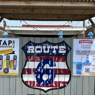 the route 66 shield on a fence