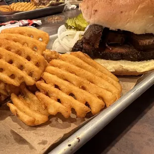 Brisket sandwich and waffle fries