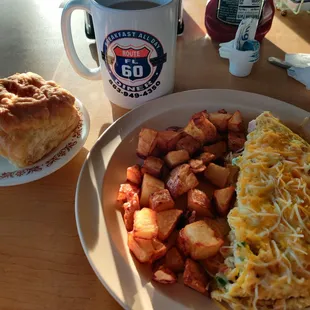 House omelette, potato, and a biscuit.