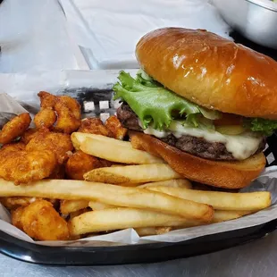 a hamburger and fries in a basket