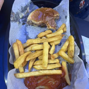 Scorcher Burger (after my husband started to dig in) and fries