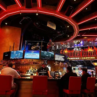 Band playing above the bar