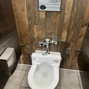 Covered toilet seat
