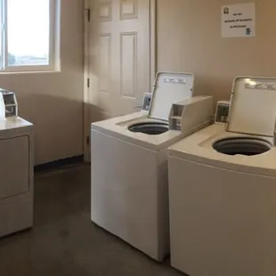 Laundry room: two washers and two dryers